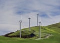 Wind turbines at a wind farm on a hill