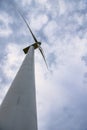 Wind turbines. Wind generators. Wind turbine generators. Alternative energy. Windmills over dramatic cloudy sky. Industrial Royalty Free Stock Photo