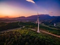 Wind Turbines Windmill Energy Farm at sunset in Italy Royalty Free Stock Photo