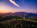 Wind Turbines Windmill Energy Farm at sunset in Italy Royalty Free Stock Photo