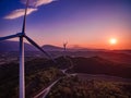 Wind Turbines Windmill Energy Farm at sunset in Italy Royalty Free Stock Photo