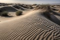 windblown sand dunes create unique patterns and designs in the desert landscape Royalty Free Stock Photo