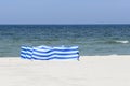 Windbreak on a wide golden beach at the Polish seaside