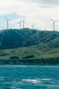Windfarm wind turbines in mountain terrain