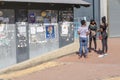 Group three African trendy young women standing street conversi