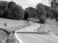 Winding asphalt road in rural landscape of Sumava Mountains, Czech Republic Royalty Free Stock Photo