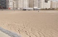 winding chain of human footprints in the sand to the trash in the ostend Royalty Free Stock Photo