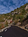 Winding country road D942 with black asphalt and white markings on a slope at canyon Gorges de la Nesque, France. Royalty Free Stock Photo