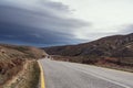 Winding country road in mountains Royalty Free Stock Photo