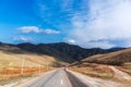 Winding country road in mountains Royalty Free Stock Photo