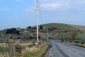 Winding countryside road and green fields