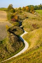 Winding Countryside Road in Rural Poland. Fall Season Colors on Foliage