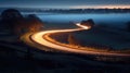 Winding curvy rural road with light trail from headlights leading through British Royalty Free Stock Photo