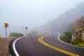 Winding desert road in the fog Royalty Free Stock Photo