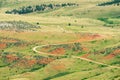 A winding dirt road on the eastern edge of the Bighorn National Forest in Wyoming, USA Royalty Free Stock Photo