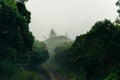 Winding fog road of the Waimea Canyon Drive on Kauai island, Hawaii Royalty Free Stock Photo