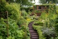 a winding garden path lined with assorted edible plants Royalty Free Stock Photo