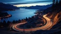 Winding lakeside road at night, bathed in the ethereal glow of moving car lights Royalty Free Stock Photo