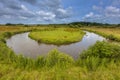 Winding meandering lowland river