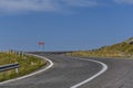 Winding mountain road with dangerous curves in Carpathian mountains. Transfagarasan road in Romania Royalty Free Stock Photo