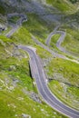 Winding mountain road. One of the most beautiful road in Europe. Popular travel destination. The Transfogarasan Road, Romania Royalty Free Stock Photo