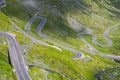 Winding mountain road. One of the most beautiful road in Europe. Popular travel destination. The Transfogarasan Road, Romania Royalty Free Stock Photo