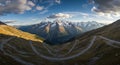 Winding Mountain Road Panorama with Majestic Peaks Royalty Free Stock Photo