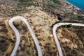 Winding mountain road, serpentine, top view. Aerial photography. Mountain landscapen Royalty Free Stock Photo