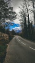 Winding mountain roads which leads to a small hillside community.