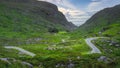 Winding narrow road running through Gap of Dunloe and Black Valley