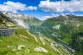 Winding pass road in the Swiss Alps, view from Grimsel Pass to Furka Pass road