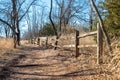 Winding path in nature with a wooden fence Royalty Free Stock Photo