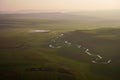 Winding river from a bird's eye view. Dawn morning