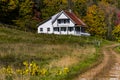 Winding Road and Farmhouse - Autumn / Fall - Vermont Royalty Free Stock Photo