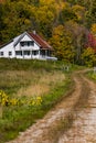 Winding Road and Farmhouse - Autumn / Fall - Vermont Royalty Free Stock Photo