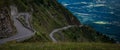 Winding road in the french alps ,with valley  in the distance.concept of adventure holiday or road trip Royalty Free Stock Photo