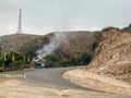 The winding road meets the hill on the horizon Royalty Free Stock Photo