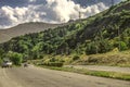 A steep road in the mountains with a descent to lake Sevan in the Gegharkunik region of Armenia Royalty Free Stock Photo