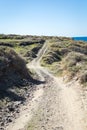 A winding road through mountains on a hot sunny day Royalty Free Stock Photo