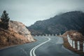 Winding Road through Mountains in Queenstown, Tasmania Royalty Free Stock Photo