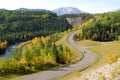 Winding road in river valley Royalty Free Stock Photo