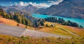 Winding road on the shore of Roselend lake. Royalty Free Stock Photo