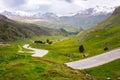 Winding road in Swiss alps, scenic mountain drive Royalty Free Stock Photo