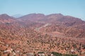 Winding road with trees in red Atlas Mountains Royalty Free Stock Photo