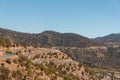 Winding road with trees in red Atlas Mountains Royalty Free Stock Photo