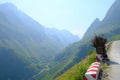 Winding roads through valleys and karst mountain scenery in the North Vietnamese region of Ha Giang / Van