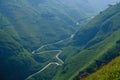 Winding roads through valleys and karst mountain scenery in the North Vietnamese region of Ha Giang / Van Royalty Free Stock Photo