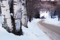 A winding rural road in winter