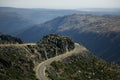 Winding serpentine road in the mountains of the Serra da Estrela or Star Mountain Range in Portugal. Royalty Free Stock Photo