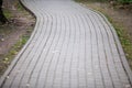 The winding sidewalk in the park. Royalty Free Stock Photo